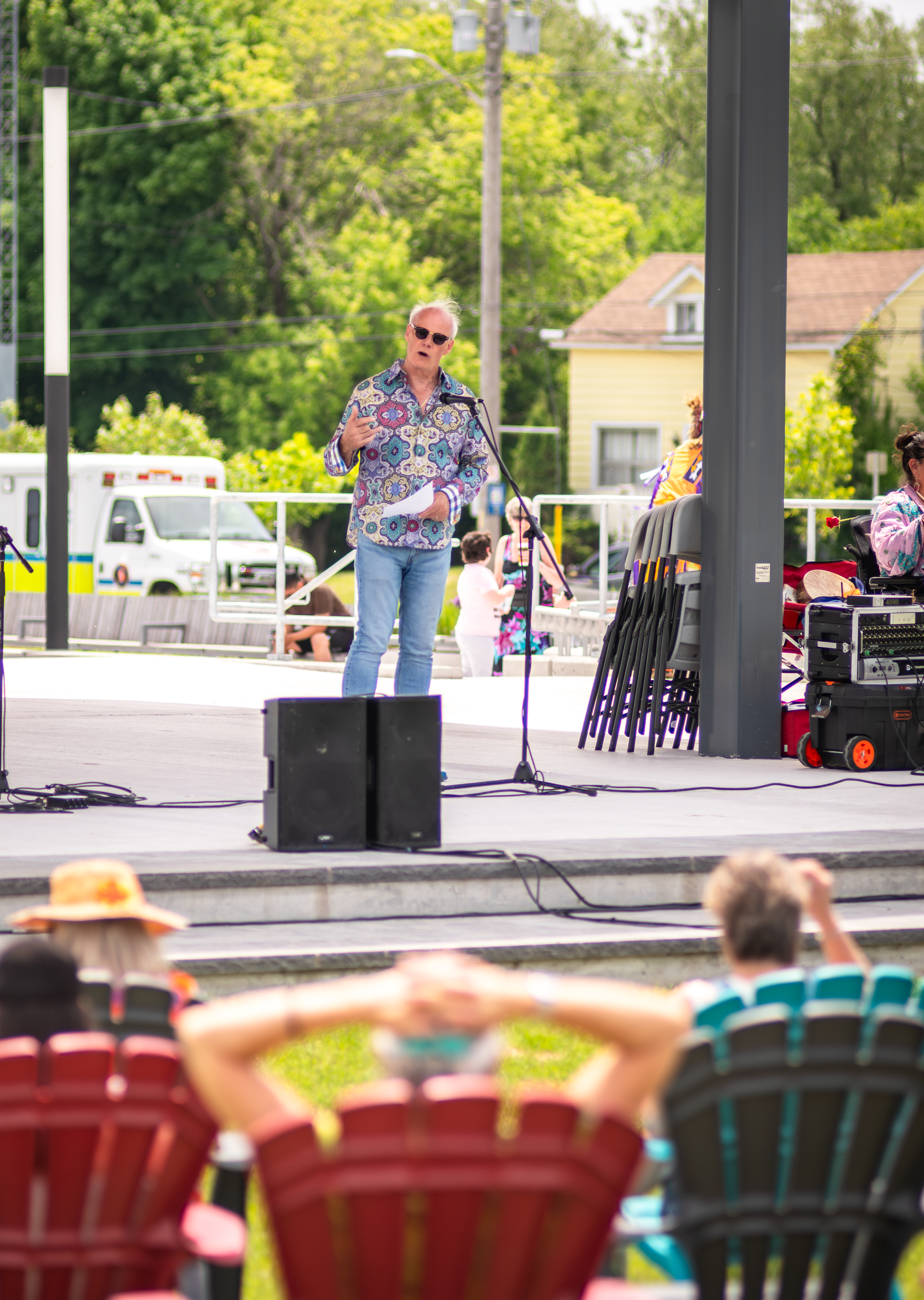 A speaker talking on stage.