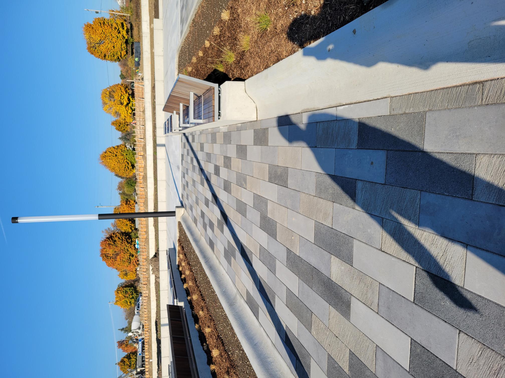 One section of the Garden of Human Rights with benches lining a part of a garden bed.